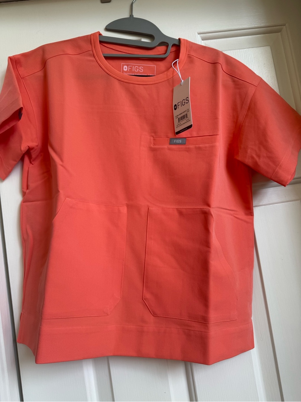 FIGS Kids Short Sleeve Top in Coral Orange